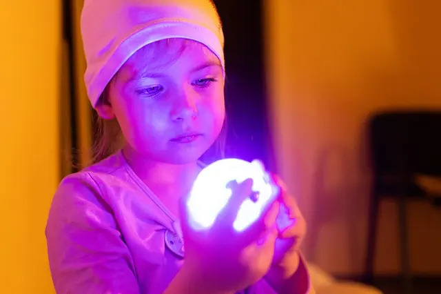 A five year old child girl in a state of sadness and introspection, listening to trance music at a trance music party. A state of introspection, sadness and mystery through minor chord progressions. Build and release. Original fluoro melodic Goa trance party at home. This captures music listening reaction to the second part of Deep Space 5D (“Observe and act with clarity. For where there is clarit