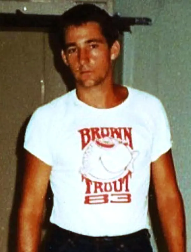 Man in Brown Trout T-shirt, Singapore 1984