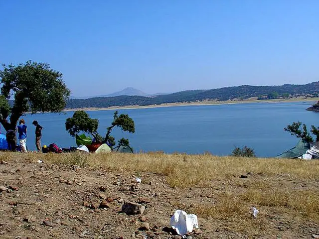 camping at the lakeside of the Idanha-a-Nova lake at Boom Festival 2004